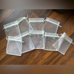 Off white draw string gift bags